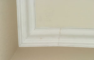Crown moulding on wall bulge